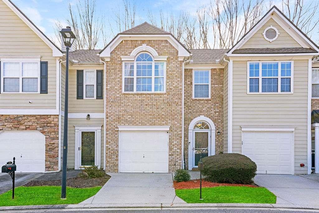 ****New Price! Modern Elegance in Jackson Trace - Upper West Side's Premier Townhome Community *** Welcome to Jackson Trace, where timeless charm meets modern convenience in Atlanta's sought-after Upper West Side. This beautifully maintained 3-bedroom, 2.5-bath townhome is now available at an incredible new price, offering upscale living with unmatched value. The open-concept main level showcases a stylish kitchen with white stone countertops, a spacious breakfast bar, and a full appliance package. Flowing seamlessly into the fireside family room, this layout is perfect for cozy nights in or entertaining friends. A separate dining room adds a touch of elegance, while the private patio is ideal for outdoor dining, grilling, or simply relaxing in the fresh air. Upstairs, the serene master suite boasts a walk-in closet and spa-inspired bath, while two additional bedrooms provide plenty of space for family or guests. A convenient laundry closet and rich dark flooring throughout enhance the home's modern flair. The spacious garage adds both storage and everyday practicality. Set in a peaceful, well-kept community, Jackson Trace offers green space, a park, and unbeatable proximity to the Braves Stadium, Downtown Atlanta, Mercedes-Benz Stadium, top universities, Hartsfield-Jackson Airport, shopping, dining, and major highways. Don't miss your chance to own a stylish, move-in-ready townhome at a fantastic new price. Schedule your private tour today and discover elevated living in Jackson Trace. Ask about our 100% financing opportunity!