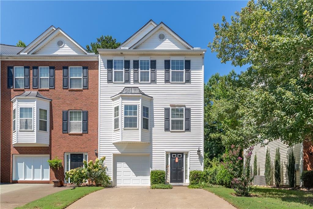 Welcome to this well maintained, move-in ready townhouse in the desirable Crawford Oaks community. Offering 2 spacious bedrooms and 2.5 baths, this end-unit townhome provides extra windows for natural light and added privacy. It features a well-designed layout with plenty of room to grow and personalize.
The main level offers a bright and open floor plan with a large kitchen that seamlessly flows into the dining and family room, where you can relax by the cozy fireplace. A lovely powder room for guests and private rear deck complete this level.
Upstairs, you’ll find two spacious bedrooms, each with its own full bathroom, including the large master suite with a double vanity, shower/tub combo and two walk-in closets! A convenient laundry closet is located between the two bedrooms.
The lower level is ready for your customization. It’s finished and stubbed for a third bedroom and additional bathroom, giving you the potential for even more living space with minimal effort, perfect for creating a private retreat.
Step outside and enjoy your private rear deck and patio, which backs up to serene woods, offering a peaceful setting for morning coffee or evening relaxation.
The community offers fantastic amenities such as a pool, tennis courts, basketball, pickleball, and a playground.
Conveniently located close to Lake Lanier, shopping, dining, and entertainment options in Gainesville, Flowery Branch, and Braselton. You’re also minutes away from Northeast Georgia Medical Center and North Georgia College.
Don’t miss the opportunity to make this beautiful townhouse your home today! Schedule a showing now to see all the potential and comfort this home has to offer.
