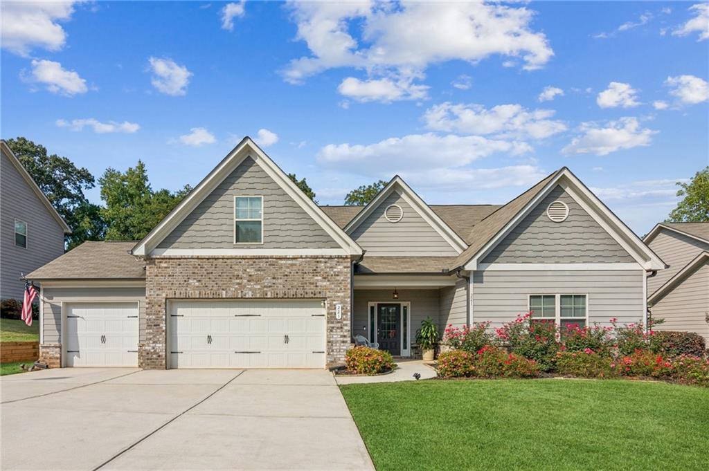 Wow! A ranch with a 3-car garage, 4 bedrooms, and 3 full bathrooms - what more could you ask for? This beautiful home offers an open-concept layout featuring a spacious kitchen with a large island and a breakfast area overlooking the private backyard. The inviting family room includes a cozy gas fireplace, perfect for relaxing or entertaining. The oversized primary bedroom boasts a tray ceiling and elegant molding. Its ensuite bathroom includes a soaking tub, separate shower, dual vanities, and a generous walk-in closet. A large bonus room or fourth bedroom with its own full bath provides even more flexible living space. Enjoy the outdoors on the lovely back patio with a stone gas fireplace - the perfect spot for your morning coffee or cool evening gatherings.