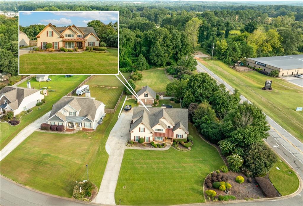 Amazing Opportunity in Sutton Oaks- 4 bedroom, 2 bath home plus a bonus room on a 1 Acre Lot!
This well maintained home features a newer roof, granite countertops, tile backsplash, custom front door and more! The layout is perfect for entertaining: formal dining room, breakfast room, family living room with fireplace, plus a private office. Retreat to the master suite on main floor with beautiful bath boasting granite and tile finishes. Outside you'll love the covered patio, a detached 2 car garage with power and water for a potential conversion into a guest suite, office or studio! Stunning Landscape with a greenhouse and garden bed, all of this on nearly 1 acre leveled yard and great curb appeal.
Conveniently located close to Hwy 316 in a small subdivision - peace and privacy without sacrificing access.
Schedule Appointment on Showing Time to view this amazing home!
