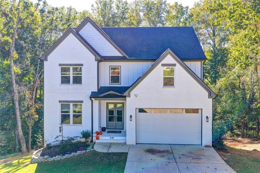 Welcome to 6181 Shoreland Circle, a beautifully maintained home located in the highly sought-after Buford area! This spacious property offers a perfect blend of comfort, style, and location. Featuring 4 bedrooms and 3 bathrooms, the home includes an open-concept living area, a bright kitchen with modern appliances, and a cozy family room with fireplace. The owner's suite offers a walk-in closet and a private bath with double vanities and a soaking tub. Step outside to enjoy a large, fenced backyard ideal for entertaining, relaxing, or family fun. Conveniently located near Lake Lanier, shopping, dining, parks, and top-rated Buford City Schools. Easy access to I-985 and I-85 makes commuting a breeze. This is a must-see home in a quiet, established neighborhood schedule your showing.This exceptional home offers an expanded back porch that seamlessly blends comfort and elegance, overlooking serene natural surroundings. Just a few steps from your backyard, enjoy private lake access the perfect retreat to relax, entertain, and take in the beauty of nature from the comfort of your own home.!