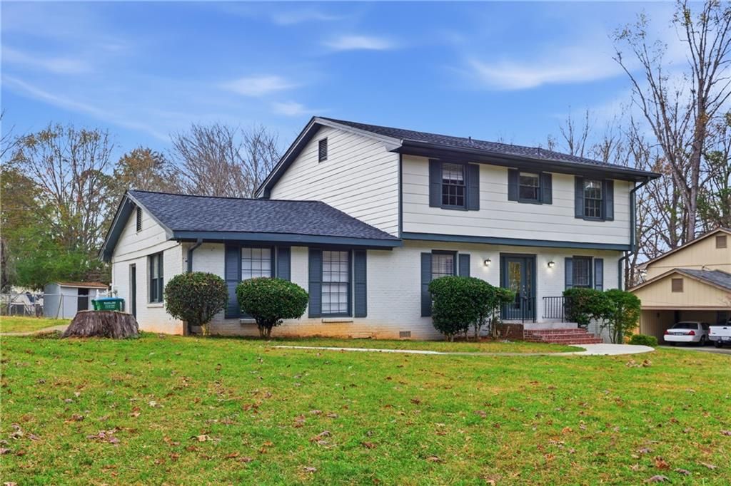 Photo of 127 Old Rosser Rd SW Rd, Lilburn, GA 30047 (MLS # 7685397)