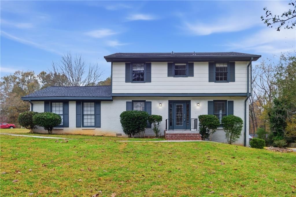 Photo of 127 Old Rosser Rd SW Rd, Lilburn, GA 30047 (MLS # 7685397)