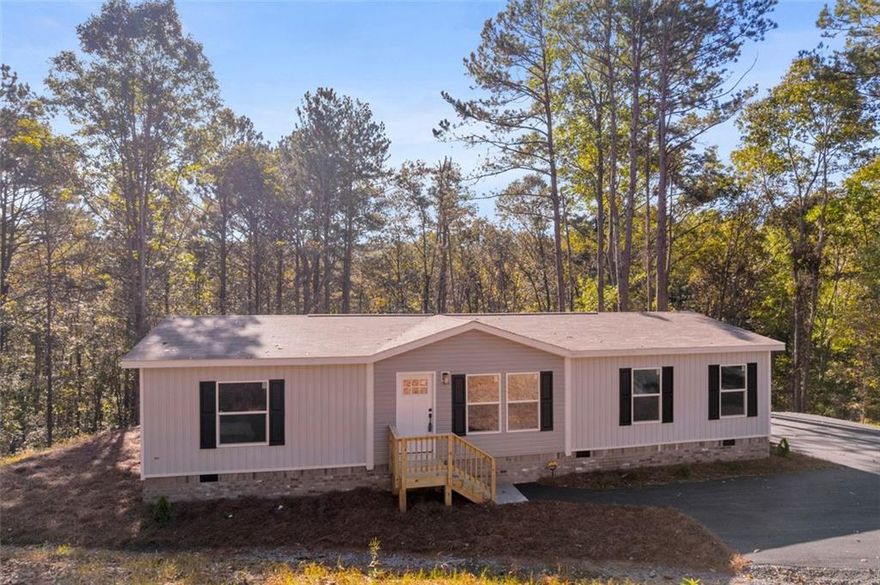 Welcome to your brand new home in Cherokee County!
This charming 3-bedroom, 2-bath residence offers a bright open floor plan, perfectly designed for both everyday living and entertaining. Nestled on 2.43 acres at the end of a quiet, private road with minimal traffic and a cul-de-sac, it provides the peace and privacy you’ve been looking for.

As you arrive, you’ll love the picturesque street lined with quaint horse farms, making every drive home feel serene and relaxing. Though it offers the feel of a rural retreat, you’re just minutes from the shops, dining, and charm of downtown Ball Ground.

Built with energy efficiency in mind, this Energy Star Rated home comes with exceptional peace of mind:
 • 1-year full manufacturer’s warranty
 • Lifetime siding warranty
 • 20-year shingle warranty
 • 7-year AC warranty
 • Warranties on all new appliances and systems

Financing options include USDA 100% loans, FHA, VA, and conventional loans, making this home even more accessible.

Cherokee County is where “the metro meets the mountains”—and this home captures the very best of both worlds. Don’t miss the opportunity to make it yours!
