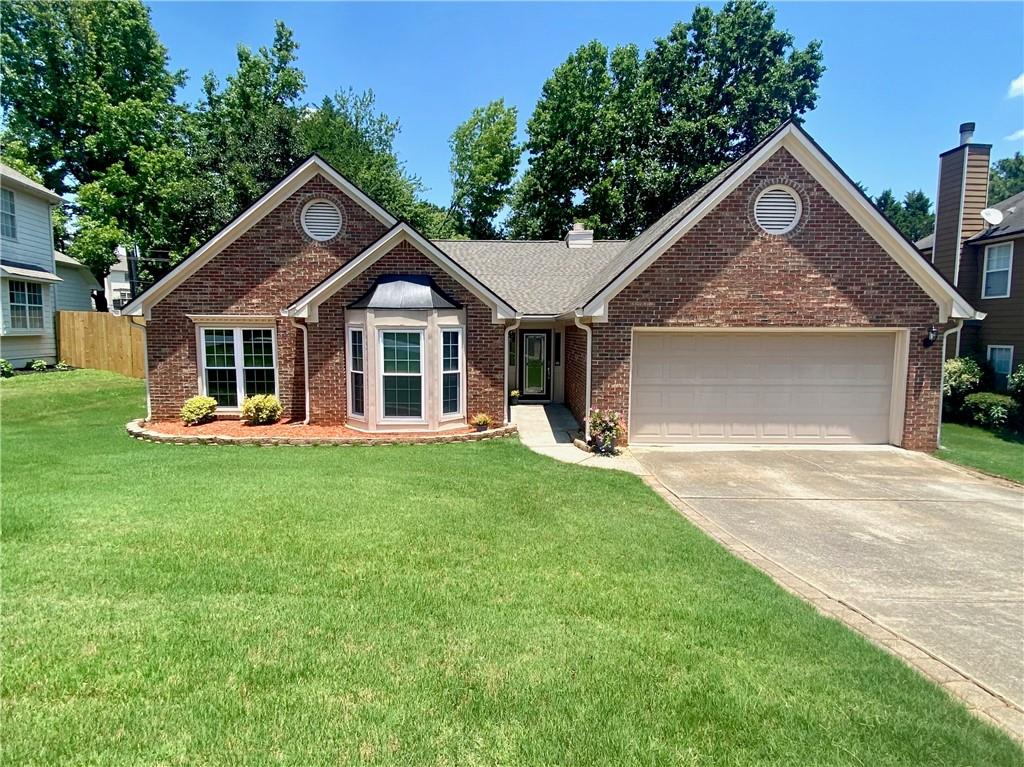 Your search ends here! A meticulously maintained gem that boasts pride of ownership! - "New Roof-Renovated Kitchen-Recently Painted Interior & Exterior". Welcome home to Timberlane & living your best life! The welcoming community of Johns Creek is..."The #1 Best Place to Live" in the NATION by U.S. News & World Report (2025-2026). Conveniently located, with easy access to all that Johns Creek & surrounding areas have to offer - adventures in culture, arts, parks, dining, shopping, outdoor activities and much more. Come experience this well-appointed home, an open concept layout that combines timeless value and craftsmanship. A perfect home for entertaining! Upon entering you'll be greeted by gleaming hardwoods throughout, vaulted ceilings and open bright spaces. The recently renovated Chef's Kitchen is a delight with gorgeous granite countertops, breakfast bar, stainless appliances & spacious eating area. Tons of natural light pours into the Kitchen & Sunroom via a wall of newer windows across the back of the home. French doors open to the expansive back deck, outstanding spaces for friends & family to gather round. The spacious Dining Room with vaulted ceiling is the ideal area to host gatherings, this space flows seamlessly into the oversized family room with fireplace...which opens directly to the Sunroom. Relax in the Master Suite with vaulted ceilings & Spa-like Master Bath. Walk into the Master closet with a sleek built in shelving system. You'll also find generous secondary bedrooms with spacious closets that share a bath. This immaculately cared for home is a dream come true and sure to impress. Incredible value and top-notch location-Minutes to Emory Johns Creek Hospital, Newton Dream Dog Park named the "Second-Best Dog Park" in the U.S (2024) by USA Today, and the soon to be completed Town Center, Creekside Park, Boardwalk, etc. Walk to award winning nationally recognized schools. Easy commute with proximity to SR-141 & 400. Everything and anything you need is just a short distance away. Don't miss your chance to call this amazing place "Home" ... Call for an appointment today. Don't miss this one!