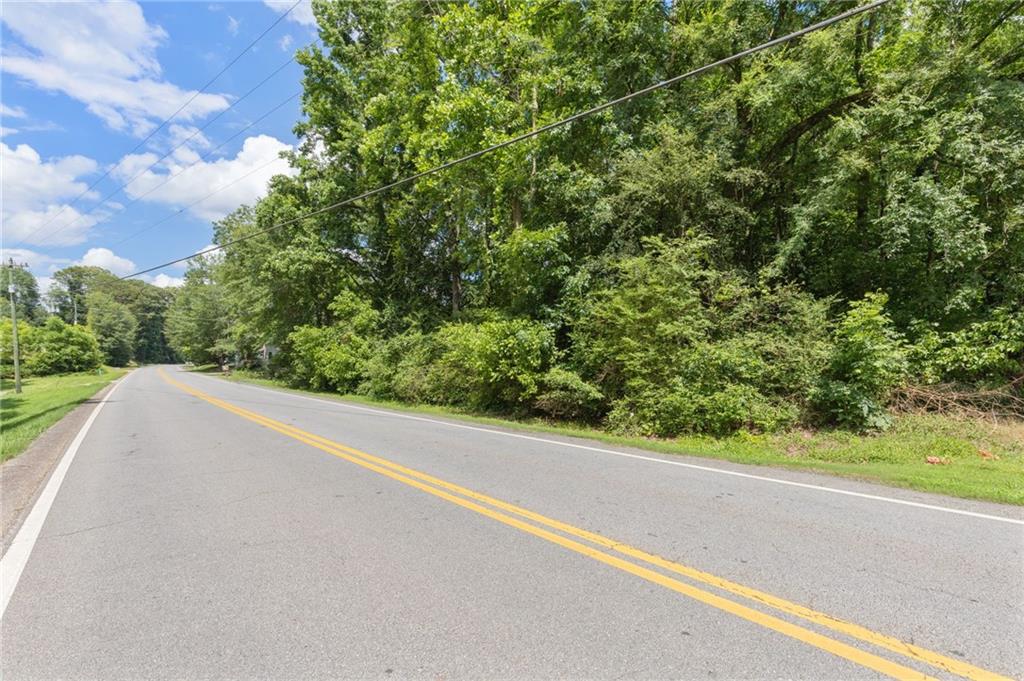 This is your blank canvas for an investment opportunity or custom home on almost two acres!