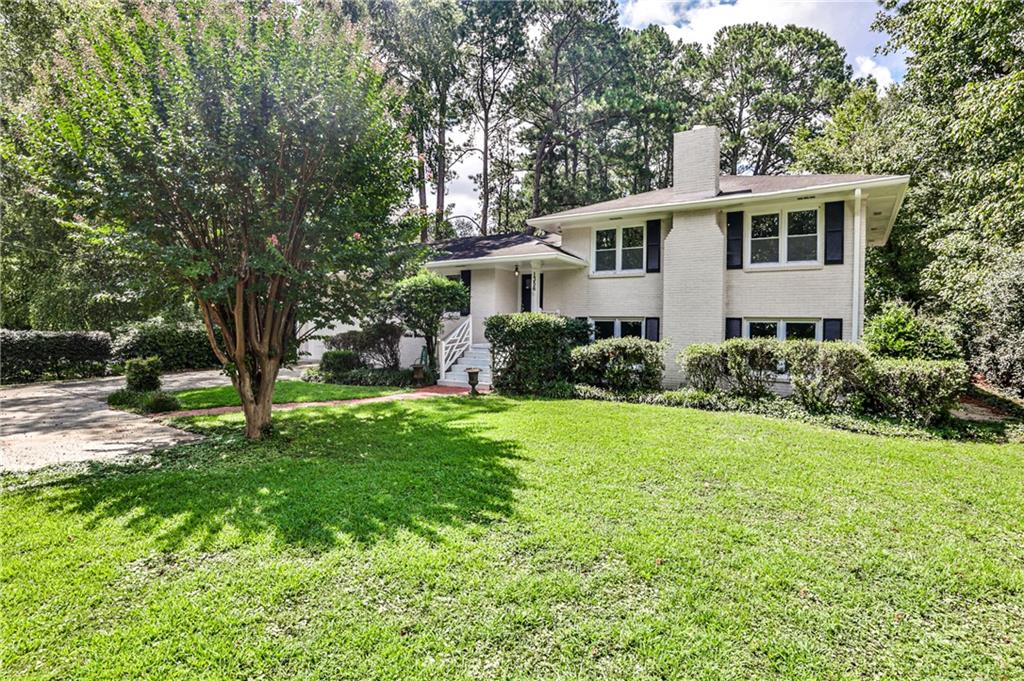 Located within the esteemed Morris Brandon Elementary School district, this well-maintained 4-bedroom, 3-bath split-level home presents both a sound investment opportunity or a comfortable long-term residence.
The kitchen is equipped with new quartzite countertops and a tasteful backsplash, complemented by updated vanities with quartzite tops in each bathroom. The main and upper levels showcase newly refinished hardwood floors, while the terrace level features a charming brick floor that adds warmth and character along with the masonry fireplace.
An oversized garage accommodates three vehicles (including tandem parking for two) and offers direct access to the backyard, facilitating convenient storage of lawn equipment.
Set on a peaceful and private 0.592-acre lot, the property includes a fully fenced backyard, and wonderful upgrades such as a newer electrical panel, a new hot water heater, and gutter guards.
This home combines thoughtful updates with practical features, making it a compelling choice in a sought-after neighborhood.