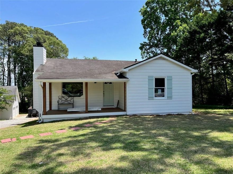 Fantastic Opportunity to Build in the Heart of Milton. Just Seconds From the Entrance of The Manor Subdivision. This 1 Acre+ Property is Perfect for Someone Looking to Build Their Dream Home in the Heart of Milton! It Can Be Used as a Primary Residence Until Construction as The Main Home Has Been Completely Renovated, With New Floors, New Kitchen, New Bath, Hardwood Floors, New Roof, New Hot Water Heater and New Decking! Live Here Until Your Ready to Build Your Dream Home! This Property Has Plenty of Room for Expansion with a Huge Detached Garage that Can Be Renovated for a Guest/In-Law Suite, Office or Storage for Those Who Need to Park Work Equipment or Own a Business. Home is Surrounded By Multi-Million Dollar Properties. This Home Would Make a Wonderful Place to Live/Work as Well an Excellent Investment Property for Future Construction!
