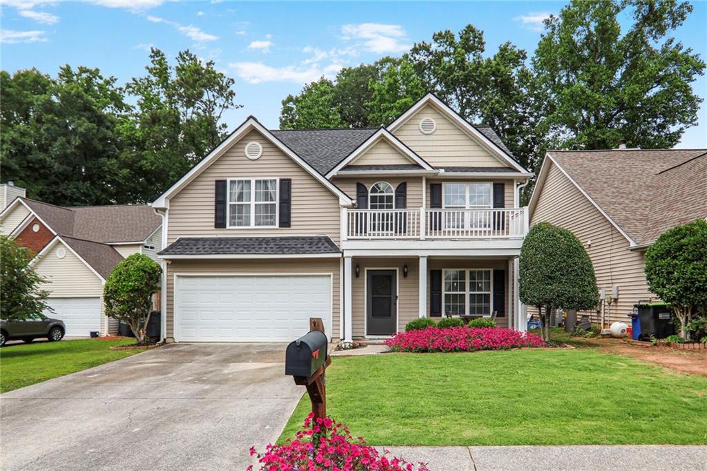 Meticulously maintained and move-in ready, this gorgeous 3-bedroom, 2.5-bath home is located in the sought-after Woodland Ridge community. Featuring an open floorplan with gleaming hardwood and tile flooring throughout the main living areas, this home offers comfort and style at every turn. The grand living room boasts a cozy fireplace, creating a warm and inviting space for relaxing and entertaining. The spacious eat-in kitchen is a chef’s dream, complete with granite countertops, stylish glass tile backsplash, and ample cabinetry. Step outside to the deck and enjoy overlooking a private, wooded backyard with a built-in fire pit; your own peaceful retreat. The primary suite features a beautiful trey ceiling, dual walk-in closets, and a luxurious bath with separate his and hers vanities, a garden tub, and a separate shower. The community offers sidewalks, a clubhouse, swimming pool, playground, and tennis courts. Ideally located just minutes from Marietta Square, Dobbins Air Reserve Base, Wellstar Hospital, and major highways, this home provides easy access to everything you need. Come tour this exceptional property and envision your next chapter in Woodland Ridge.