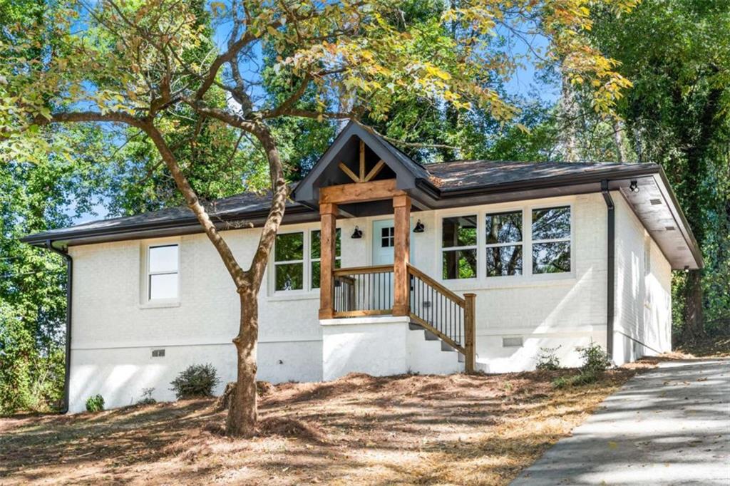Welcome to this exquisite 3-bedroom, 2-bath residence in the heart of Decatur, where modern luxury meets timeless design. Upon entering, you'll be greeted by gleaming hardwood floors that flow throughout the open-concept living space, creating a seamless transition from the spacious family room to the beautifully redesigned kitchen-ideal for entertaining or relaxing in style. The kitchen showcases elegant finishes, sleek cabinetry, and generous counter space, blending function and sophistication. The primary suite offers a tranquil retreat with a spa-inspired bathroom and designer details. Every inch of this home reflects thoughtful craftsmanship, featuring fresh interior and exterior paint, a new roof, updated HVAC, plumbing, and electrical systems, ensuring comfort and peace of mind for years to come. The expansive lot provides ample outdoor space for leisure or gatherings, while the location offers unmatched convenience with nearby shops, restaurants, and entertainment just minutes away. Enjoy effortless access to I-285, I-85, Downtown Decatur, Avondale Estates, and Downtown Atlanta. This fully renovated move-in-ready home is the perfect blend of elegance and practicality-schedule your private tour today and experience luxury living in one of Decatur's most desirable areas. Inquire about available special financing grants for qualified first-time buyers.
