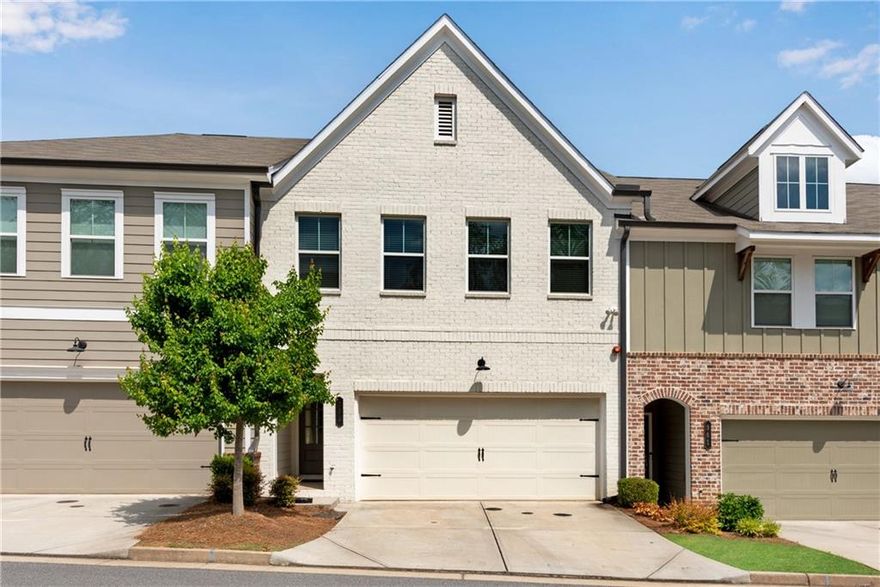 Stunning Townhome in Historic Marietta – Move-In Ready!

Welcome to this pristine townhome, perfectly situated in the heart of historic Marietta. Bursting with charm and modern upgrades, this home is truly move-in ready. Step inside to a bright and airy open-concept living space filled with natural light, featuring a cozy gas log fireplace and a stylish rustic farmhouse accent wall. The spacious kitchen is a chef’s dream with crisp white cabinetry, gleaming stone countertops, a large island with breakfast bar seating, and a stainless-steel 5-burner gas range. With ample storage and a seamless flow into the living and dining areas, it’s perfect for entertaining.

The serene owner’s suite offers a peaceful retreat, with a spa-like ensuite bathroom that includes a double vanity, tiled walk-in shower, and generous walk-in closet. Upstairs, you’ll find two additional spacious bedrooms, a full bathroom, and a conveniently located laundry room.

Thoughtful details like pull-down blinds and modern finishes run throughout the home. Nestled in a quiet, well-maintained community, the HOA covers all exterior maintenance for low-stress living. Enjoy access to a dog park and a cozy patio area with a firepit—perfect for relaxing evenings. Located just under a mile from vibrant Marietta Square with its shops, dining, and weekly farmers market, and minutes from I-75, Roswell Road, Truist Park, and The Battery, this home offers the ideal combination of comfort, style, and convenience.