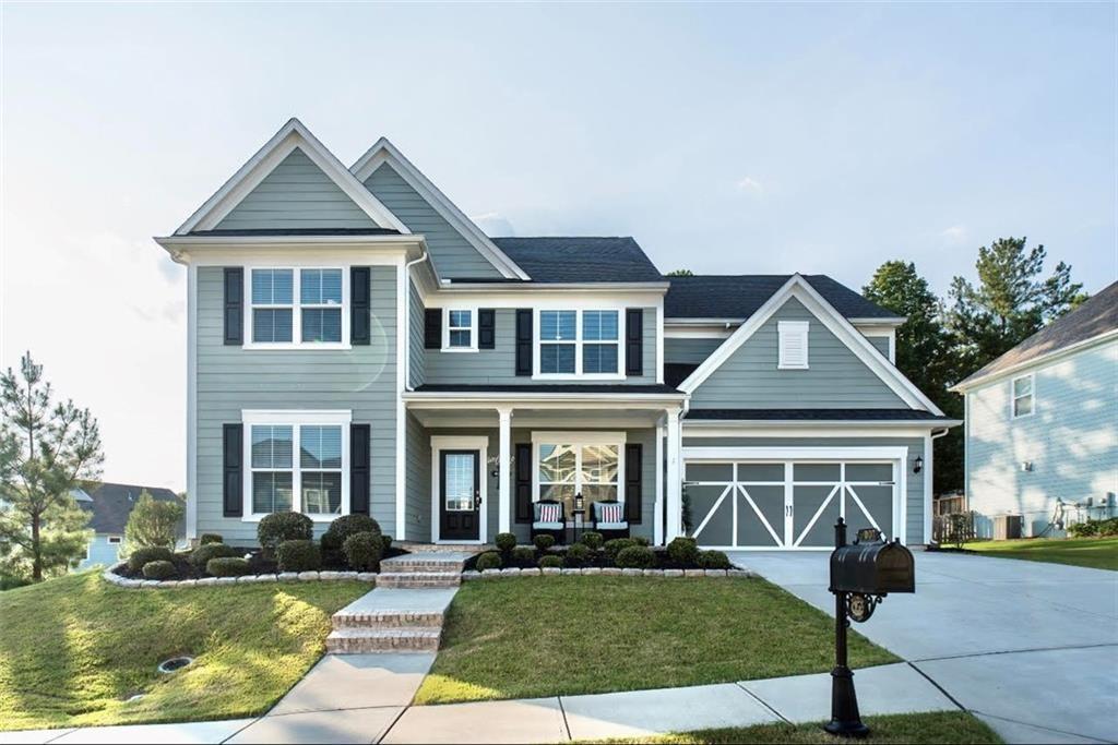 This stunning, “practically new”, and move-in ready home, sits on a friendly and private cul-de-sac in the highly sought-after Reunion Golf and Country Club Community. A beautifully crafted exterior, a welcoming front porch, and a green and wooded private backyard. Step-into this thoughtful floor plan by Pulte to encounter a hallway that leads you to the elegant trim work and tray ceiling in the separate dining room, a generously-sized study enhanced by contemporary French glass doors, crown molding and luxury vinyl flooring throughout the main floor. It boasts an open-concept gourmet and fully renovated kitchen with quartzite countertops, stainless steel appliances, a large island with breakfast bar and underneath cabinets, glass tile backsplash, and an extended kitchen room with more cabinets and a counter top ideal for your coffee area. Being the heart of the home, the kitchen seamlessly connects to a cheerful breakfast room, an elegant living room complete with fireplace, and a seven large windows with a glass outdoor “Bright Sunroom”. The second floor offers an inviting and convenient LVP floored loft that takes you to the sophisticated Primary Suite which includes crown molding, tray ceilings a sitting room retreat, boasts two walk-in closets and a master bathroom with an oversized tiled shower with bench, and rainfall showerhead. An adjacent laundry room with sink. Two secondary bedrooms that share a large closet and a double vanity bathroom, plus a third guest/suite bedroom with its full bath and walk-in closet. All the bathrooms feature quartzite countertops for a touch of elegance. The tandem garage also offers a convenient sink for all your exterior projects, and last but not least an irrigation system that ensures a lush, well-maintained lawn year-round. This home is located in the original section of Reunion, with the safety feature of a Fire Station within the community. It provides Golf Cart access to the Braselton Lifepath for all the nearby shopping, school and dining activities, and it is just five minutes from the advanced Northeast Georgia Hospital and top rated clinical and medical facilities.**Reunion Golf & Country Club** is one of the premier golf courses communities in North Georgia and boasts unique amenities that include a Clubhouse, Restaurant, Swimming Pool with Water Slide and a Kiddie Pool, Lighted Tennis &, Pickleball Courts, top-of-the line private 18-hole Golf Course that highlights a hole number seven, a par five, with two greens, Workout Facility, a Driving Range, Playground, Parks, and sidewalks throughout the neighborhood for walking or jogging. Quick access to main highways such as I-85, I-985, Peachtree Industrial, and Highway 53. Make this vacation lifestyle home, yours!!!