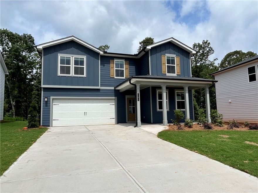 Welcome to the newest Century Community in Flowery Branch, Union Heights!  Experience the enchanting Travis plan at Union Heights, a brand new community! Upon entry through the front door, you're greeted by a wide foyer leading to a grand great room and a well-appointed kitchen, complete with a generous center island. The main floor also boasts a flexible study/bedroom. Upstairs, discover three inviting secondary bedrooms with its own walk-in closet accompanied by a full hall bath, a sprawling loft, and a convenient laundry room. The second floor culminates in an elegant primary suite, featuring a private bath with dual vanities, a walk-in shower, and an expansive walk-in closet.