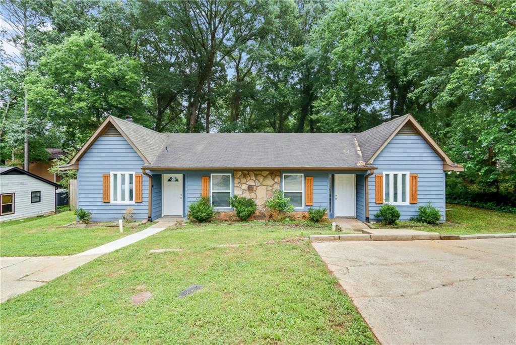 PRIME LOCATION DUPLEX 5 minutes to Marietta Square! Each side of duplex is 2 bedrooms 2 full bathrooms and a half bath for guest off main living area! Walk in closets in both units in both bedrooms, en suite bathrooms perfect for roommates or double master suites! As you walk in you'll notice the vaulted oversized living rooms in both units, bar area in 450 side unit and study/playroom area in unit 452! Unit 450 & 452 upgrades include new LVP flooring throughout, granite countertops, new toilets, newer paint, and drainage added! Loaded with storage including coat closets, linen closets, laundry room closets, and exterior storage sheds! Units just vacated for easy showings! Coveted Marietta High School district! 5 minutes to The square, I-75, grocery shops, dining, and parks!