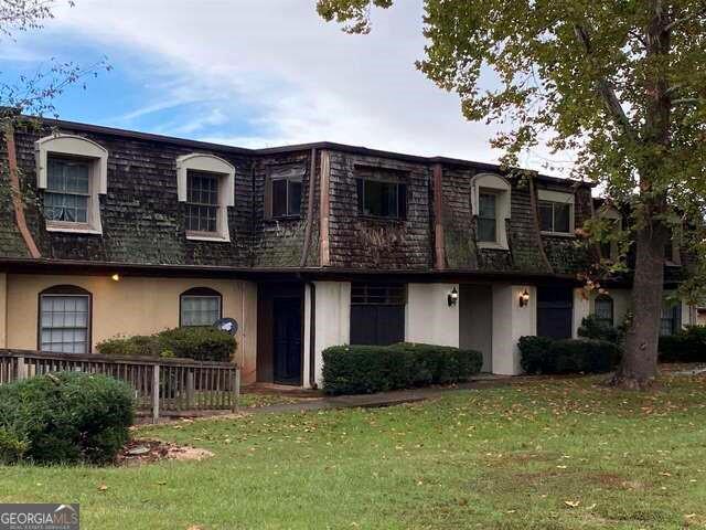 This home features a fireplace & built-in bookcase in the living area with separate dining room w/wood floors. Owners bedroom has a bonus/sitting area w/ private wooded view. Move-in ready at an affordable below market price. Active HOA & Neighborhood watch organization! Unit is sold as-is, 1 year Home warranty is included!
