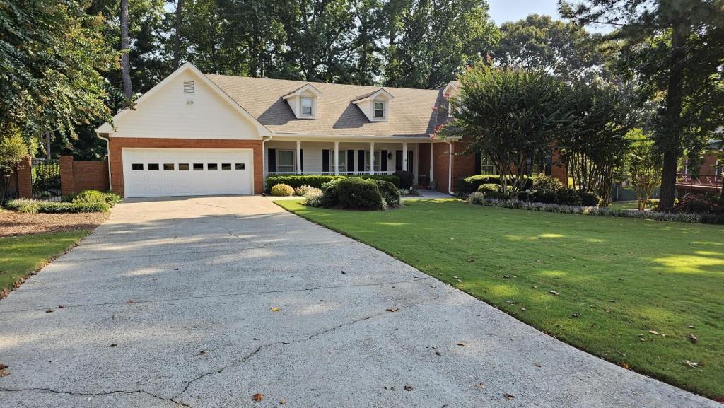 Browning Way is an expansive home and lot in a fantastic neighborhood and community. It sits directly across from Arcado Elementary school and feeds into Trickum Middle and Parkview High. Beautifully landscaped and professionally maintained and managed. Its formal foyer entry way feeds into the front living room and spacious family room with fireplace and built in bookcases. There is a formal full size dining room with tray ceiling off the kitchen. The kitchen is a cooks paradise featuring name brand appliances including a Wolf gas cooktop with down draft venting. Kitchen also features an island, breakfast room and sunroom. The breakfast room opens to a huge deck with view of a beautiful back yard. Main level further includes half bath, laundry room with sink, 2 large bedrooms and 1 large master suite. Master bath has whirlpool tub, separate shower, double vanity sinks and walk-in closet. There is also a very large upper-level loft bedroom with its own full master bath suite including garden tub, separate shower and double vanity sinks. Basement has playroom, 2 bedrooms, full bath and kitchenette. This home is large, well preserved and in great location!