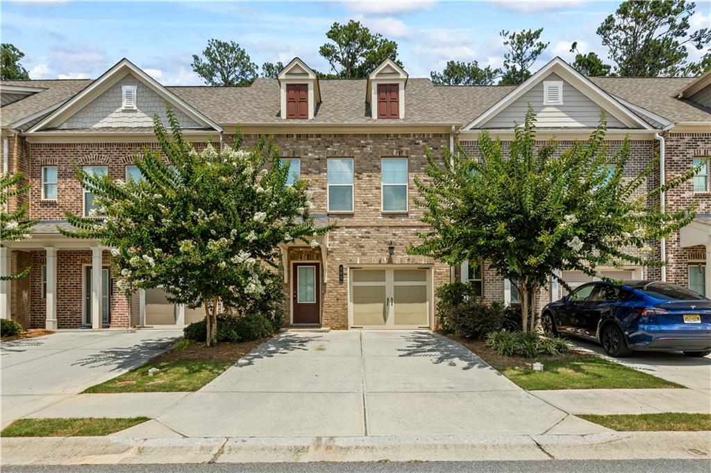 **SPECIAL CLOSING CREDIT TO SAVY BUYERS WHO DON'T NEED AN AGENT. YOU CAN SAVE BIG ON THIS TOWNHOUSE! CALL FOR MORE INFO. Location, Location! Welcome home to this gorgeous & meticulously maintained 3-Story Townhome tucked away in the conveniently located Luxomni Pointe subdivision. This Townhome feels massive inside with all of the natural light, mint condition LVP floors (throughout the entire 2nd floor), and a cozy atmosphere. The Primary suit is on the top floor, the kitchen is on the middle floor, and the 2 remaining bedrooms are on the first floor. This is perfect for privacy and peace and quiet. The heartbeat of the home is the kitchen with a view to the inviting family room. Enjoy meals in the spacious eat-in kitchen that offers ample counter space and storage, plus open dining - all in one area. The primary suite is spacious and has a beautifully designed bathroom with dual vanities, a shower, and a walk-in closet. Two spacious additional bedrooms share a full bath on the first floor, so there is a full floor buffer zone. You'll love the quiet deck off of the kitchen and the back patio that faces the trees, so you have no neighbors looking at you every day, lol. This home has plenty of room to entertain this summer!! Conveniently located near schools, parks, shopping, and dining options, this home provides easy access to everything you need. Don't miss the opportunity to make this townhome your own. CALL TO SCHEDULE YOUR PRIVATE TOUR TODAY!