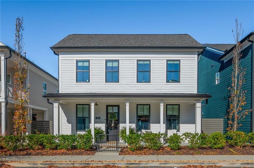 Welcome to 51 Little Magnolia Lane, a beautifully upgraded 4-bedroom home nestled in the picturesque and one-of-a-kind community of Harmony. This rare “Charleston” floor plan offers the ultimate in comfort and convenience with a primary suite on the main level, a cozy upstairs loft, and three additional generously sized bedrooms. Step inside from the inviting covered front porch to an open-concept layout featuring a bright and airy living room, dining room, and kitchen—perfect for both everyday living and entertaining. The living room is bathed in natural light through large windows, and the cozy gas log fireplace adds a touch of warmth and ambiance. Gorgeous luxury vinyl plank flooring flows throughout the main floor. The chef-inspired kitchen boasts white cabinetry, upgraded light fixtures, a large island, sleek Quartz countertops, and a spacious pantry. The expansive primary suite is a true retreat, featuring a custom accent wall, large windows, a walk-in closet, and en suite bathroom with dual vanities and a beautifully tiled shower. Upstairs, you’ll find a cozy loft area perfect for relaxing or reading, along with three additional large bedrooms (perfect for a home office!) and a full bathroom with dual vanities and a tub/shower combo. This home is designed with convenience in mind, featuring two laundry closets—one on each level. Outdoors, you’ll enjoy a private, fully fenced courtyard—ideal for al fresco dining, entertaining, or simply enjoying the fresh air. The welcoming covered front porch offers the perfect spot for sipping your morning coffee or unwinding in the evening. Additional highlights include a 2-car rear-entry attached garage, main floor half bathroom, upgraded hardwoods on the stairs, luxury vinyl plank flooring upstairs, and energy-efficient windows, doors, and insulation, ensuring comfort year-round. Situated in the thoughtfully designed Harmony community, this home is just steps from the community pavilion, lush green spaces, trails, a garden, and even an apiary—all built around the charming city hall. Designed by the renowned Lew Oliver, Harmony offers a unique atmosphere that blends charming homes and thoughtful details with the beauty of nature. This upgraded home is better than new! Schedule your private showing today and experience the exceptional lifestyle Harmony has to offer.