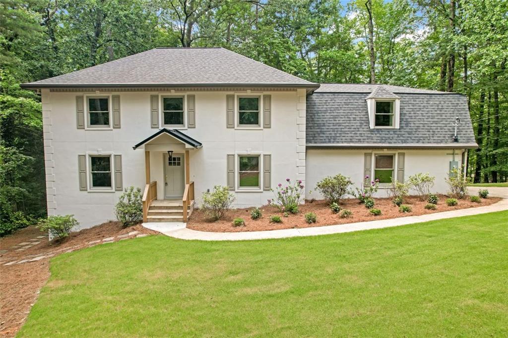 This stunning home offers the perfect blend of warmth and elegance, starting with the cozy family room featuring a crackling fireplace, ideal for snuggling up on chilly nights. The beautiful kitchen is a chef's dream, equipped with a wild cooktop and stunning backsplash that adds a touch of sophistication. Upstairs, three spacious bedrooms provide ample space for rest and relaxation, with the master bedroom standing out as a serene retreat featuring a double vanity. The fully finished basement adds even more functionality, boasting a versatile room and a gym/office space perfect for staying active or productive. Stepping outside, the beautifully designed deck with a roof provides a sheltered spot to enjoy the outdoors, while the picturesque backyard offers a serene atmosphere, with a lovely view of the neighbor's pond adding to the tranquil ambiance.