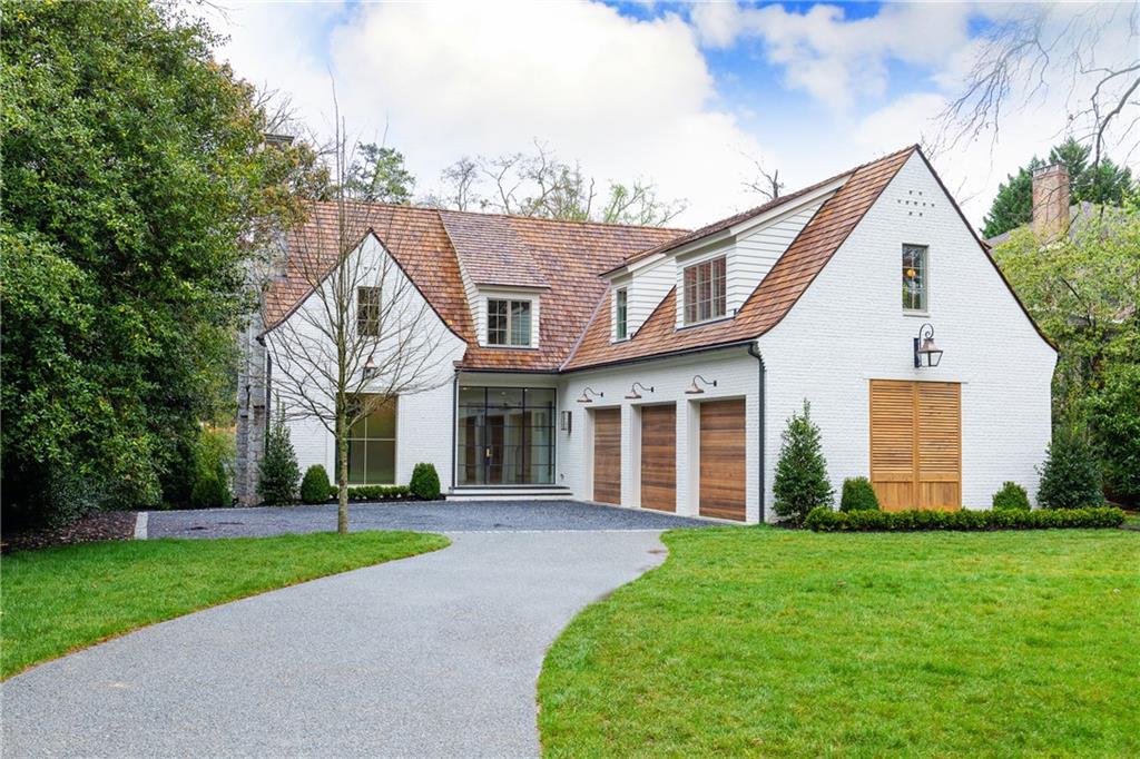 One of a kind new construction by Siegel Construction & Design on one of Atlanta's most exclusive streets in the South! Open floor plan on main makes this home a dream for entertaining! Main floor features include oversized iron windows & iron doors, oak monocoat floors, reclaimed beams in the living room/study, and white oak bookshelves in the family room. Kitchen boasts vermont white marble, dual fuel Wolf range, and Subzero refrigerator. Butler's pantry with dishwasher. Covered porch overlooks the infinity pool. Finished, daylight terrace level with 10 ft ceilings.