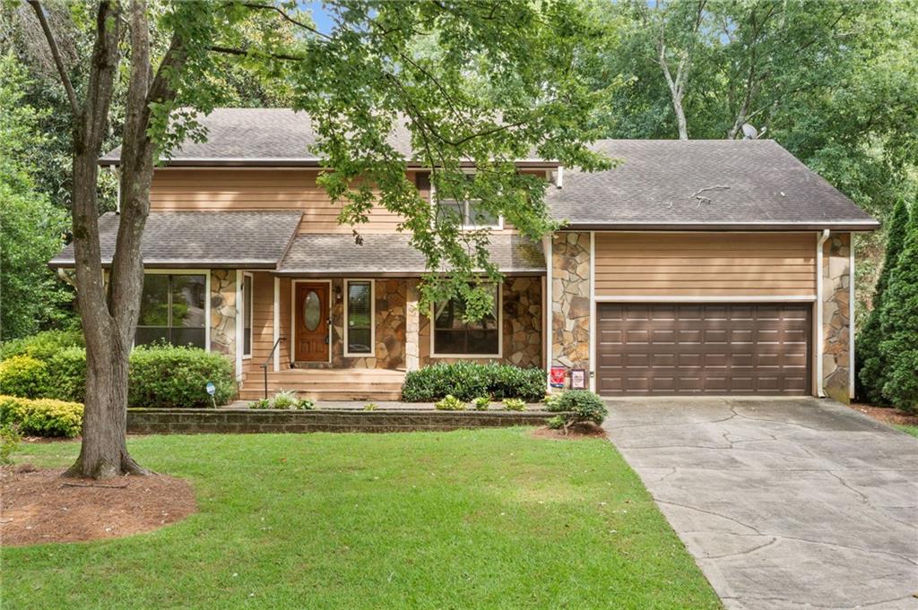 GOLF COURSE LOT WITH A POOL ON CHEROKEE HOLE 4! While this home is move-in ready, it also presents a fantastic opportunity for those eager to add their personal flair and modern updates. With solid bones and classic features throughout, you’ll find the ideal canvas to create your dream haven. When you enter the home, you are greeted by a large living room and a separate dining room offering plenty of space for entertaining or relaxing. The highlight of the kitchen is the large 8 burner gas range with double ovens and vent hood. The kitchen offers easy access to the swimming pool. The kitchen flows seamlessly to the family room and there is a main level bedroom and full bathroom. Upstairs has 4 spacious bedrooms. The oversized primary bedroom features vaulted ceilings and provides a peaceful retreat. It is hard to find bedrooms as large as the 3 secondary bedrooms with ample closet space. There are 2 large walk-in closets that may provide the opportunity to add a third full bathroom on the upper level. Enjoy sweeping golf course views from the screened in porch and deck overlooking the swimming pool. There is plenty of space to entertain indoors and outdoors in the backyard oasis. Perfect for those seeking both value and location, this property invites you to reimagine, renovate, and truly make it your own.