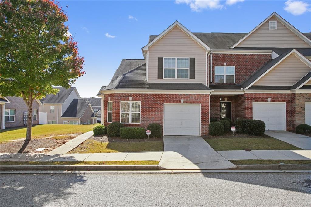 Beautiful and Spacious 3-Bedroom End Unit Townhome with Attached Garage in Atlanta! Step inside this stunning townhome and be greeted by a formal dining room that flows seamlessly into an inviting open family room, perfect for relaxing or hosting. The well-designed kitchen boasts matching appliances, ample cabinet storage, and a convenient layout to make cooking and entertaining a joy. The master suite is thoughtfully situated on the main floor, complete with a spacious walk-in closet and a private bath, providing a peaceful retreat. Upstairs, you'll find two additional bedrooms that are perfect for family, guests, or a home office. The backyard offers a charming patio space and plenty of greenery, ideal for enjoying Atlanta's beautiful weather or gathering with friends and family for outdoor entertaining. With easy access to major freeways 85 and 285, you're just minutes from shopping, dining, and all that Atlanta has to offer. This townhome truly has it all comfort, convenience, and a prime location. Don't miss your chance to make it yours. Schedule a showing today and discover the perfect place to call home!