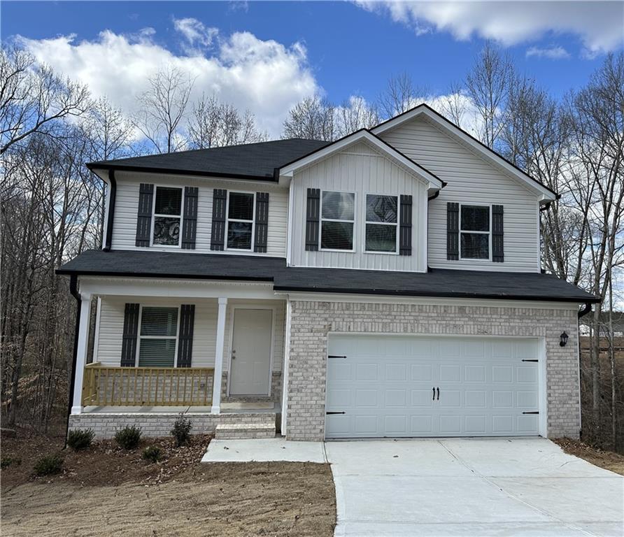 AMAZING BUILDER GIVEAWAY!!! BASEMENT HOME With over 2300 total square feet with an unfinished basement. This newly built home is one of the last few new homes available in the neighborhood. For the mid $300k's this is a steal. Step into the Lovely Kyndle Plan and experience its captivating features! This beautiful 4-bedroom, 2.5-bathroom home, complete with a 2-car garage, complete with an unfinished basement that offers a blank canvas for you to customize to your liking. This home offers a seamless open design perfect for hosting gatherings with family and friends. The kitchen features elegant granite countertops, tile backsplash, and stainless steel appliances (microwave, dishwasher, and freestanding stove). Stylish 36" cabinets enhance the open-concept dining area. The living room boasts a relaxing fireplace, creating a cozy atmosphere. Enjoy the abundance of recessed lighting throughout the home, along with luxury vinyl plank (LVP) flooring on the main level and in the wet areas of the second level. Stairs, hallways, bedrooms, and closets are carpeted for added comfort. Upstairs, you'll find a conveniently located laundry room. The spacious primary suite includes a walk-in closet and a luxurious bathroom, which features a tile shower stall, granite countertops, and a dual vanity. The secondary bedrooms offer ample storage with generously sized closets, and there's an additional bathroom equipped with elegant fiberglass shower/tub combos and granite countertops. Best of all, this property has no HOA fees and is just minutes away from I-20. Don't miss out on incredible buyer incentives! You could qualify for closing cost assistance or have the option to reduce your interest rate with the preferred lender. The Home is USDA-Approved and Qualifies for 100% Financing. Ask how you can secure one of these amazing new construction homes and take advantage of these fantastic benefits. Don't miss your chance to own this stunning home and enjoy the lifestyle you deserve! Welcome Home...*Please note that the photos are not of the actual property; they are stock images representing a Kyndle plan for illustration purposes.** Home is under construction.