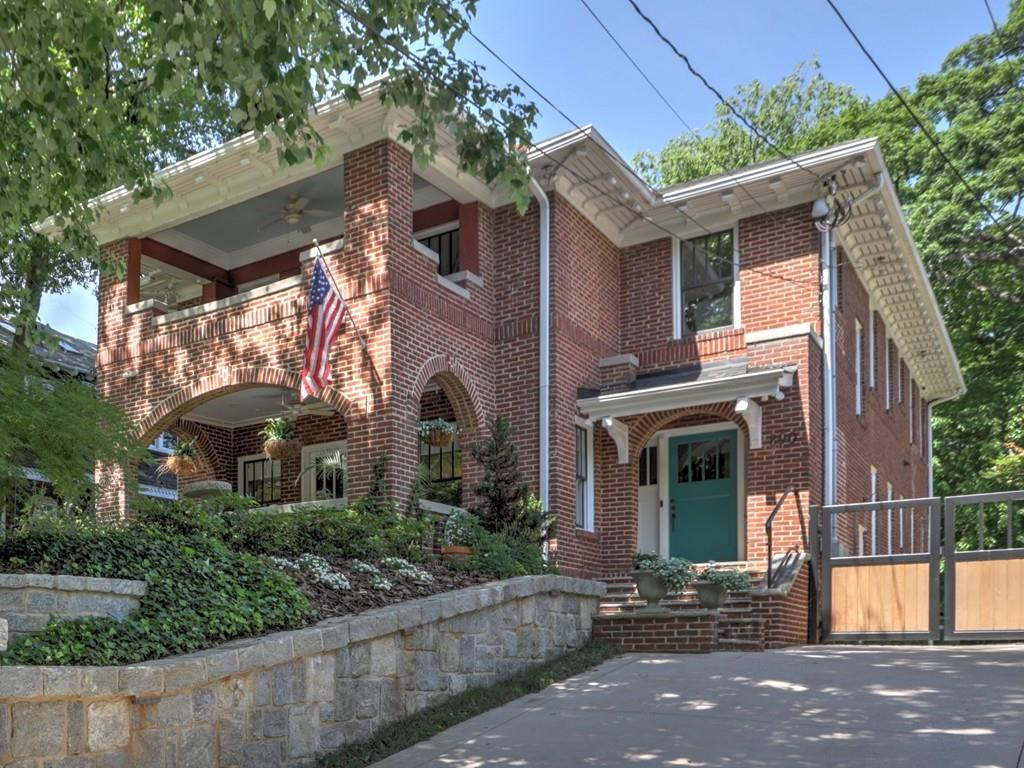 Amazing opportunity to lease this stunning fully RENOVATED craftsman home just a few steps from Piedmont Park in Midtown's Garden District. It is the perfect combination of Intown Living in an incredible home with private garden and award winning public schools. FURNISHED OR UNFURNISHED! 1 YEAR LEASE but 2 YEAR LEASE PREFERRED starting July 2023. Gracious outdoor stairs lead to the welcoming 2-story foyer open to the fireside living and dining rooms. From the living room French doors walk out to the cozy front porch overlooking to the park like level front yard. The fully equipped designer chef's kitchen offers an oversized island with stone counter tops, professional appliance package including a 6-burner Wolf range, steam oven, warming drawer, built-in fridge, dishwasher and walk-in pantry. Butler's pantry features an icemaker, wine cooler and built-in kegerator. Kitchen is open to the family room and breakfast room with French doors leading to the oversized deck and park like back yard. To complete the main level, there is a bedroom/office with a queen size murphy bed and en-suite full tiled bath room. Elegant curved front stairs and back stairs lead to the well appointed upper level. Appealing primary suite features a king size bed, a fireside sitting room, French doors to upstairs patio, designer luxury spa like bath with 2 vanities, soaking tub, oversized walk-in shower and large walk-in closet. One bedroom features a twin bed with en-suite bath room. The nursery and jungle decorated bedroom share the hall bath with tub/shower combo and dual vanities. Laundry room with utility sink off the upper hallway. Special features include hardwood floors and sound system throughout as well as a central vacuum system. Basement offers great storage opportunities. An entertainer's delight awaits you outside. From the large deck with a deluxe outdoor kitchen (Primo XL ceramic grill, grill, power burner, sink) to the fireside (with attached TV) screened in porch overlooking a beautiful backyard. Fenced yard features a play set, shed and also a bocce ball court. Park up to 4 cars in the driveway. Rent includes landscaping, water and trash. Perfectly located in the heart of Midtown, just two blocks from Piedmont Park, The Beltline, Ponce City Market, excellent schools, and tons of popular restaurants, shopping, and attractions!