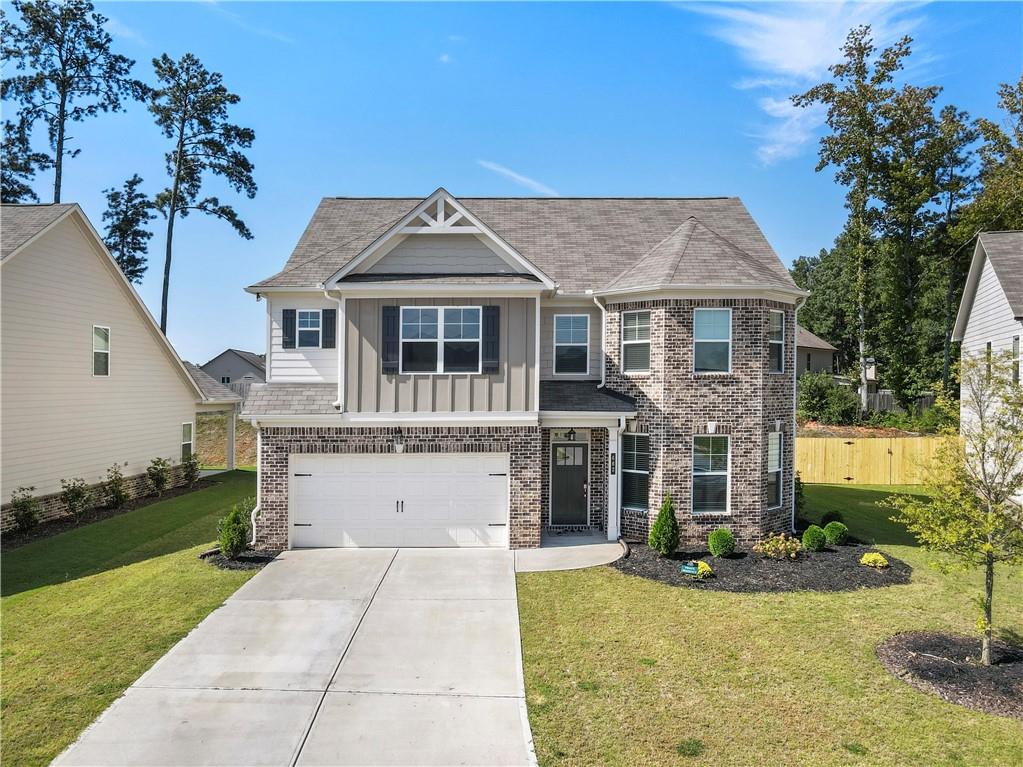Welcome to this well maintenance 3 years old home, nested in a quiet community, offers the perfect blend of comfort, and modern. Only 10 minutes drive GA Mall, HWY 316 and connecting to Hwy 85. Curve appeal with brick front, bay window, and 3 side hardy flank siding. Its offers you with separate dining with shadow box wall, connecting to the grant kitchen with white kitchen cabinets, stainless steel appliance, big granite island, and counter top, open view to family room with coffered ceiling, and fire place. Main level offers you with wood floor, and rear stair case. The second level offers you with 4 Bedrooms and 2 full baths, and laundry room. The Master Suite offers you with sitting room, separate shower, tub, and big walk in closet. Back yard offers you with big back porch to relax and barbeque with your family. Make this charming home to be your new home. Property is occupy, and have pest. Must have 24 notice, to remove pest, and supra lock box to be available at front door. No exception.