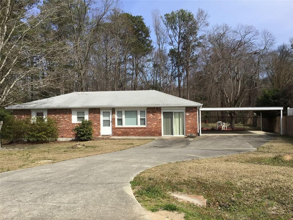 Estate Owned Property-Sold As-Is. Put your spin and ideas to work. Needs TLC. In tact/Livable. A must see for a new owner or savvy investor. This charming 4 Sided Brick Ranch has a huge leveled fenced-in yard with an out-storage building. There are solid updated windows throughout. The covered back patio is a perfect space to entertain. There is also a spacious separate room with exposed brick. 3-5 minutes from I-20, 5-7 minutes from Downtown Douglasville, shopping and restaurants.