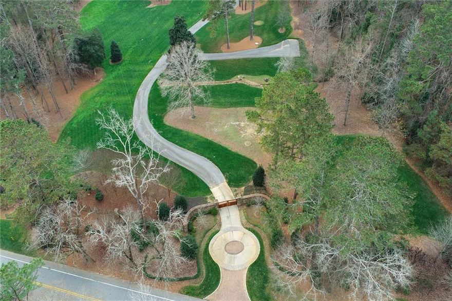 A most private landscaped oasis inside I-285 in the City of Sandy Springs! Build your estate/compound in this serene setting in the utmost location! Enter through the huge electronic gates and drive through 13+ acres. Manmade spring-fed pond with fountain and docks adds to the tranquil views. Unique, newer 1br, 1ba farmhouse on property.  The small house includes a wrap-around covered porch, full kitchen, massive garage storage space that fits an RV plus several other vehicles. This barn would also be a great pool house or guest house, horse barn, music or acting studio. This large estate property has room for a pool, tennis court, and horses. Access to the Chattahoochee River at Whitewater Creek Park. No Sign.