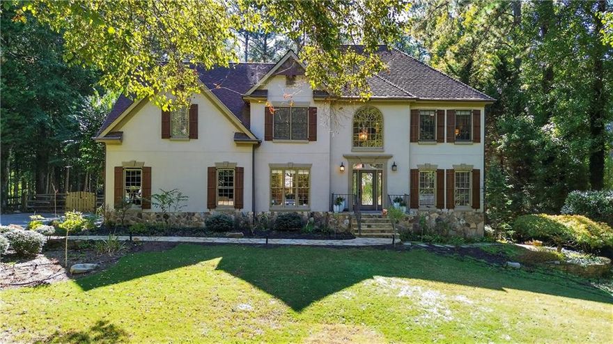 This elegant home perfectly blends sophistication and comfort. The main level features white oak hardwoods throughout the family room, sunroom, office, dining room, kitchen, and Butler’s pantry. The updated kitchen shines with new cabinets, granite countertops, and premium appliances. Upstairs offers four spacious bedrooms with hardwoods, including a primary suite with walk-in closet and spa-like bath, plus a second bedroom with private bath and double closets. Enjoy crown molding throughout and cozy nights by the two-story stone fireplace with cedar beams. The finished basement includes a full bath, bedroom, and flexible living space. Step outside to your private retreat with an inground saltwater pool with slide!, gas stone fire pit, and lush yard perfect for entertaining or relaxing in style.