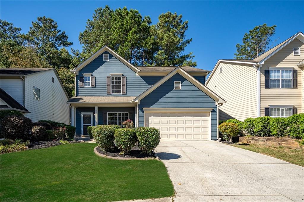 Beautifully updated 4-bedroom, 2.5-bath home located in the heart of Woodstock. This move-in-ready property features wood flooring on the main level and brand new carpet upstairs, offering a fresh, modern feel throughout.
The main floor boasts a bright, open layout ideal for everyday living and entertaining. The kitchen opens to a comfortable family room with great natural light, while the laundry room is conveniently located on the main level. Upstairs, you'll find four spacious bedrooms. The primary suite offers vaulted ceilings, a walk-in closet, and a private bath with a soaking tub with tile surround and separate tiled shower.
Additional highlights include stepless entryways at both the front and back, and a private, fenced backyard with an extended patio—perfect for outdoor dining or relaxing.
Located within walking distance to The Outlet Shoppes at Atlanta, and just minutes from Downtown Woodstock, top-rated schools, parks, dining, and with easy access to I-575 for commuters. A rare opportunity to own a well-maintained home in a prime location with room to grow.