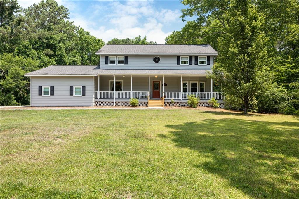 Prepare to embark on your own country adventure with this delightful farmhouse on a sprawling 2.6-acre oasis! With 3 bedrooms and 2.5 bathrooms, the lovingly maintained one-owner home offers the perfect balance of cozy living and countryside serenity but with shopping and dining not far away. Besides the large dining room and living room, the main level boasts a bonus room that would make a terrific office or could easily be transformed into a 4th bedroom with just the addition of a door into the existing closet. All new kitchen appliances including refrigerator along with new windows on main level. New upstairs carpet and a newly remodeled Owner's bath! The full unfinished basement is a blank canvas just waiting for your creative touch. Whether you dream of a home theater, an in-law suite, a workshop, or a giant playroom for your kids, the possibilities are endless. This is your chance to design the ultimate personalized space! Forget about those pesky homeowners' association rules -- There's no HOA to cramp your style here so you have the freedom to use your acreage as you desire. Build an addition on the property, let the in-laws park their RV for a visit... the choice is yours! You aspiring farmers are in luck with a great garden spot conveniently fenced off on the property, embrace your inner gentleman farmer and cultivate your very own harvest of organic vegetables. Living out your "Green Acres" dreams has never been easier. Escape the hustle and bustle of the city life and surround yourself with the beauty of nature from the porch sanctuary complete with porch swing and Big Green Egg! Spend your morning sipping coffee and taking in the beautiful view and feel the stress of the world melt away. The property offers the space and privacy you've been longing for. With endless potential and no restrictions, you can truly make this home your own and create memories that will last a lifetime.