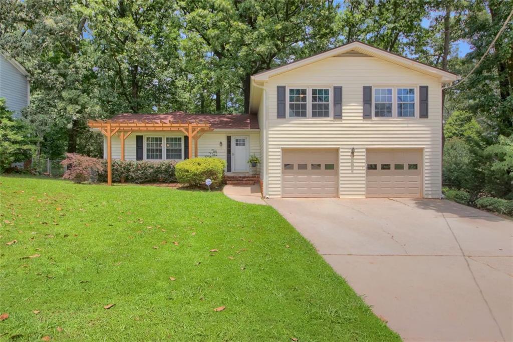This spacious ITP home offers an unbeatable combination of space, flexibility, and income potential—all in a highly convenient location. Featuring a fully equipped in-law suite that rents for $1,350/month, this property is perfect for homeowners looking to offset their mortgage or accommodate multigenerational living.
Inside the main home, you’ll find two generous living spaces, oversized bedrooms, an expanded sunroom/home office, a 2-car garage with extra storage space, and a long driveway with ample parking. The backyard offers both room to relax and entertain.
Recent updates include new flooring in the main living room and in law suite bedroom. There’s plenty of opportunity to personalize and increase value through additional cosmetic updates.
The kitchen is functional and welcoming with Corian countertops, abundant wood cabinetry, pantry storage, a breakfast bar, and a dining nook with a view into the cozy family room. A formal living room with built-in bookshelves can easily serve as a home office, playroom, or flexible-use space. The comfortable family room, complete with a wood-burning fireplace, opens directly to the back deck and connects to a convenient mudroom/half bath area on the way to the garage.
The highlight of the home is the private 1 bed / 1 bath in-law suite—featuring its own full kitchen, living/dining area, washer/dryer, and separate entrance via a private side deck. The suite was previously leased for $1,350/month and includes its own HVAC system for independent heating and cooling. The bedroom in the suite has brand-new flooring, adding to its turnkey appeal. Just add a simple paver path from the driveway to the deck for complete guest or tenant privacy.
The main house offers 4 bedrooms and 2.5 bathrooms, while the separate apartment provides a fully self-contained living space. All bedrooms are generously sized, and the sunroom makes for an ideal home office, creative space, or quiet retreat.
Located near Mercer, Emory, CDC, VA, and just minutes to Downtown Decatur, major roads, parks, dining, and retail. Whether you're looking for a primary residence with built-in rental income, space for extended family, or an investment opportunity—this home delivers!