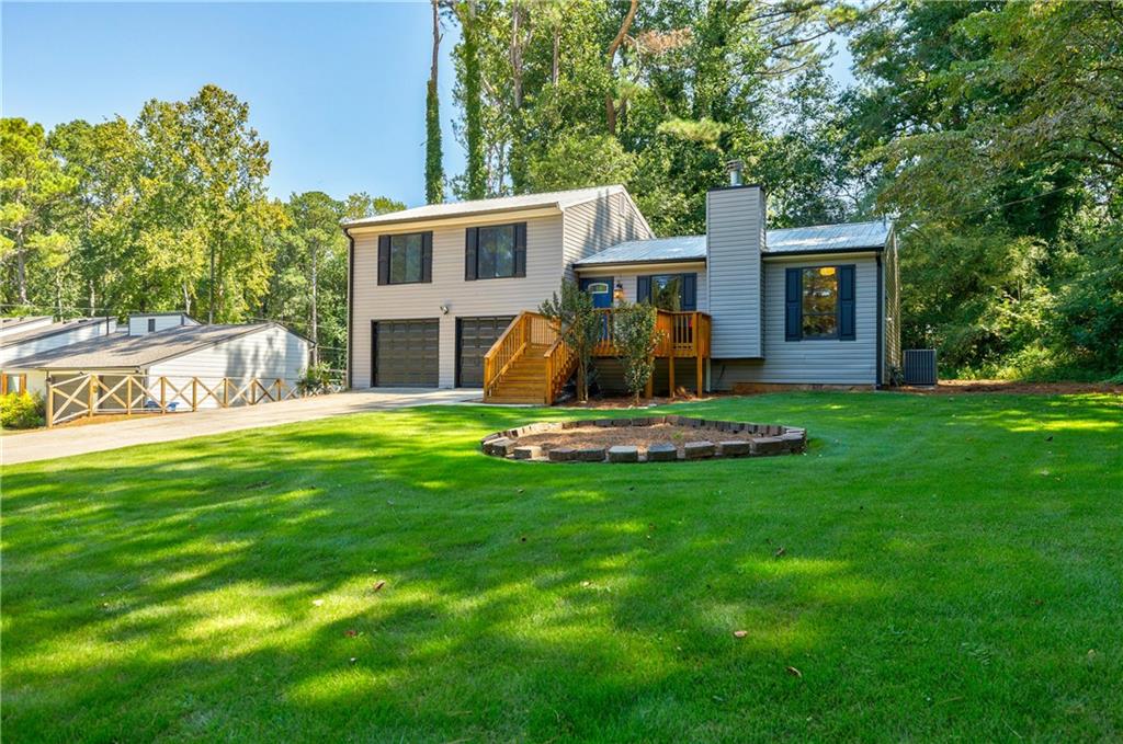 Step into this beautifully renovated 3-bedroom, 2-bath home where thoughtful design meets peaceful living. The heart of the home is a chef-inspired kitchen, fully modernized with sleek cabinetry, solid surface countertops, and contemporary fixtures—a perfect blend of style and function. Both bathrooms have been tastefully reimagined, offering spa-like ambiance with upscale finishes.
Entertain or unwind in the expansive family room, where plenty of natural light, open flow, and cozy design invite lively gatherings or quiet evenings in equal measure. Beyond the walls, discover your own park-like backyard—a tranquil, lush escape dotted with mature trees, manicured greenspace, and a sense of serenity perfect for morning coffee or weekend barbecues.
Just minutes from local parks, restaurants, schools, this home delivers both tranquility and accessibility.