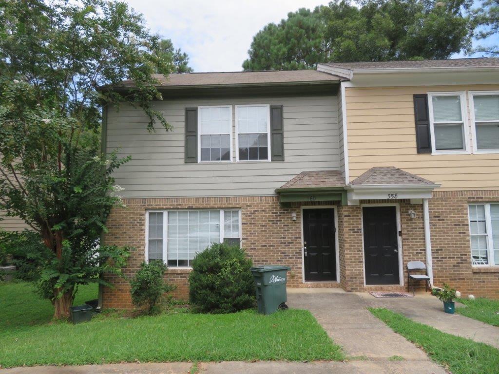 Beautiful townhome in Manning Place subdivision! End unit with brick accents! Spacious living room! Separate dining/breakfast area! Kitchen features white cabinets, black stone counters, and stainless steel appliances! Half bath on main! Primary bedroom includes private bathroom with extended vanity! Two spacious secondary bedrooms share another full bathroom! Rear deck overlooks backyard! A must see! Don't miss out!