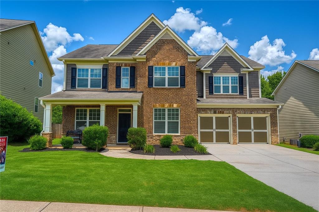 Welcome Home to 397 Royal Sunset Drive! Step inside this loved home where you will find the perfect blend of comfort, space and functionality. Just off the entry foyer you will find the formal living and dining rooms providing a great space for hosting guests and/or family gathers. The bright open living space on the main level is ideal for every day living and entertaining. The kitchen offers solid surface counters, breakfast bar and bright open eat-in area with a view to the family room. There is a guest bedroom and full bathroom on the main level as well. Upstairs is the oversized owner's retreat with soaking tub, separate shower, double vanities and walk-in closet. Spacious secondary bedrooms share the hall guest bath. There is also a large media/bonus room. Perfect for games, movies, office space and more! Covered front porch and fully fenced back yard. The community offers a playground and a pool. Come visit this new listing today!