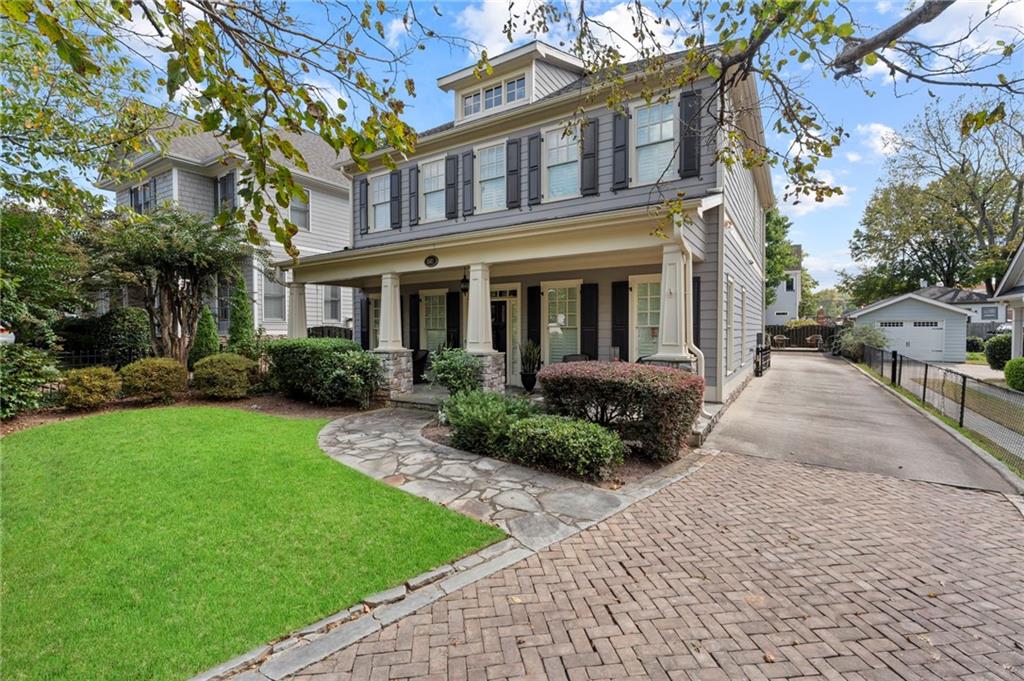 Walk to school! Beautifully appointed traditional floorplan home located 1 block from Woodward Academy's main campus. This home features a large great room with coffered ceilings and hardwood floors. Incredible kitchen with tons of storage, built in table, under cabinet lighting, granite, walk in pantry and butlers pantry. A cozy keeping room off kitchen with built in book cases and wonderful fireplace. Beautiful master suite with in-suite bathroom and walk in closet. Large secondary bedrooms with private baths. HUGE bonus room could easily be a 4th bedroom.