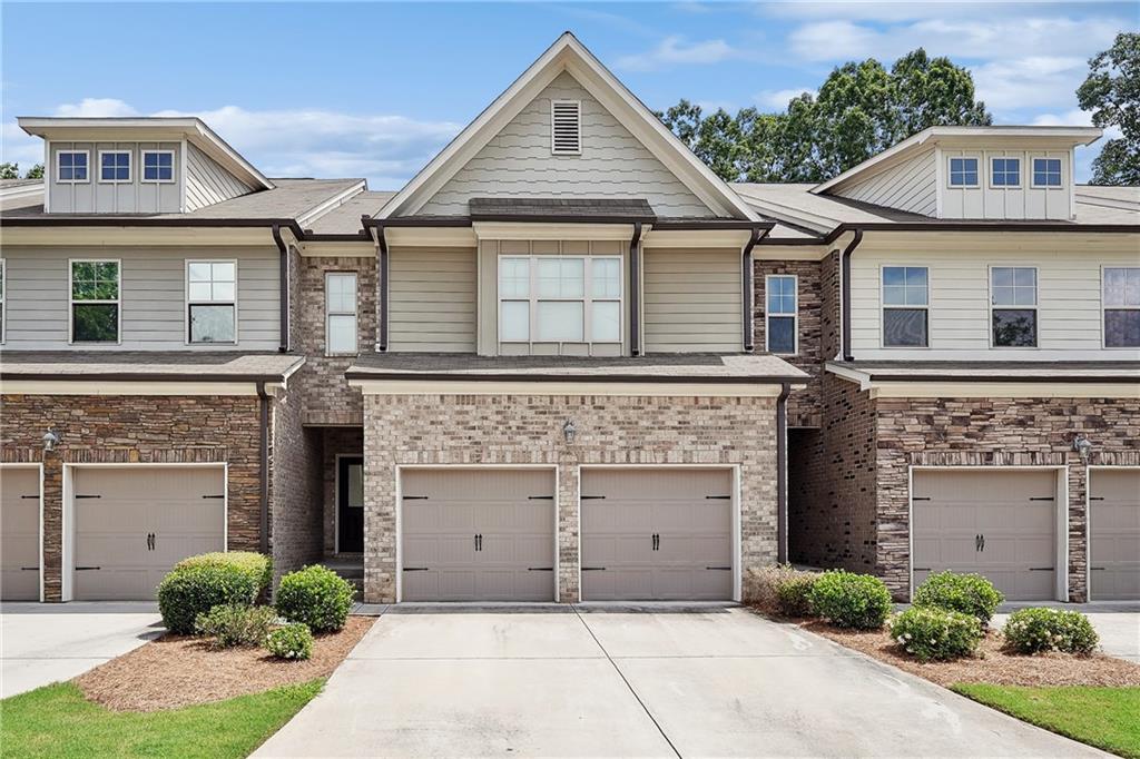 Tucked inside a gated community and zoned for top-performing schools, this stylish townhome offers the perfect blend of comfort and convenience. Just minutes from Cawley Park, hospitals, shopping, dining, and entertainment, the location makes everyday living effortless. Inside, rich hardwood floors guide you through the main level, where an open-concept kitchen with breakfast bar flows seamlessly into the spacious living and dining areas. Step outside to your private deck perfect for morning coffee or evening wind-downs. Upstairs, the oversized primary suite features a generous walk-in closet and a spa-inspired bath. The finished basement adds incredible flexibility with a media room, extra bedroom, full bath, and plenty of storage—ideal for guests, a teen suite, or game nights.