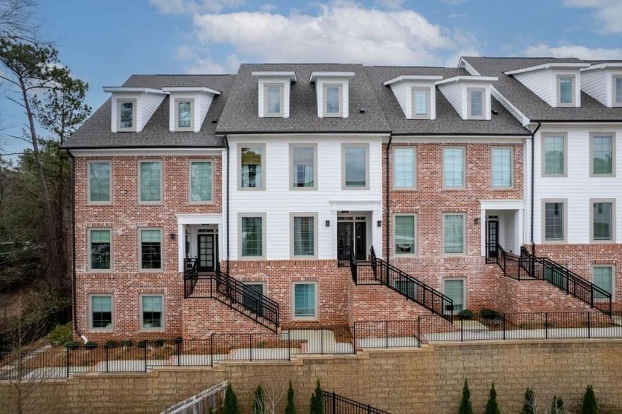 Luxurious 2-Bedroom, 2-Bathroom Condo in the Sought-After Maxwell Community   This exquisite property blends style, comfort, and convenience in one of Alpharetta's most desirable locations. Situated near The Maxwell's pool and just a short walk from vibrant retail, dining, and the lively downtown Alpharetta scene, this home offers unparalleled urban living.    Designed with an open-concept layout, the space is bathed in natural light from expansive front and rear windows. Premium LVP flooring and fresh, neutral tones create a modern and inviting ambiance. A stunning custom-built electric fireplace serves as a stylish focal point, adding warmth and sophistication to the living area.    The gourmet kitchen boasts brilliant quartz countertops, a large island with seating, sleek white cabinetry, and top-of-the-line stainless steel appliances. The primary suite provides a tranquil retreat with a custom closet organizer for optimal storage and functionality, along with a luxurious en-suite bath featuring a frameless glass shower and double vanity. A second bedroom on the lower level offers privacy and flexibility-ideal for a guest suite, home office, or personal studio.    Step outside to a private covered balcony, perfect for unwinding in a serene setting. The Maxwell community offers resort-style amenities, including a sparkling pool, clubhouse, fire pits, and more. An attached one-car garage with additional driveway and guest parking ensure ultimate convenience.    With easy access to Downtown Alpharetta, Avalon, the Alpha Loop, and GA-400, this home is perfectly positioned for both relaxation and adventure. Whether you're enjoying the Saturday Farmers Market or exploring downtown's shops and restaurants, this condo delivers the best of modern urban living.