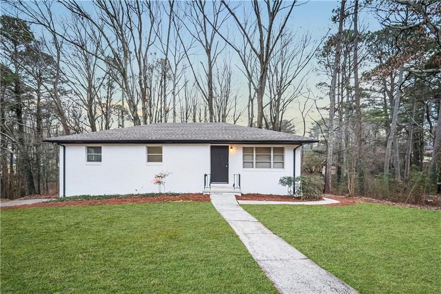 Welcome to this beautifully remodeled 4-bedroom, 2-bath brick home that perfectly blends style, comfort, and everyday functionality. From the moment you step inside, you’ll love the open-concept layout where the living room, dining area, and kitchen all flow together—ideal for relaxing evenings or hosting family and friends. Natural light? Tons of it. Gorgeous floors? Yep. A chill color scheme? You bet. The kitchen is a true standout, featuring brand-new stainless-steel appliances, granite countertops, and plenty of cabinets--because who has too much storage? No one. The primary suite offers a peaceful retreat with a private bathroom, while two more bedrooms and a full bath on the main level give you options, whether for family, guests, hobbies, work-from-home or more. Need a little extra space? Head down to the basement where you’ll find a flex room with a closet—perfect for a bedroom, office, gym, craft room, or anything else you need. Outside enjoy a deck great for weekend barbecues, morning coffee, or just soaking up some fresh air and the pets will appreciate the fenced backyard. The classic white brick exterior not only adds charm but makes for easy maintenance, too. Location? You’re set! Just minutes from shopping, dining, and major highways (I-75 & I-285) making errands and commuting a breeze. Bonus: Get up to $10,000 in buyer assistance when using Mark Baker of SWBC Mortgage with no first-time buyer requirement! If you're ready for a move-in-ready home that checks all the boxes, schedule your tour today and start imagining life in this charming space!