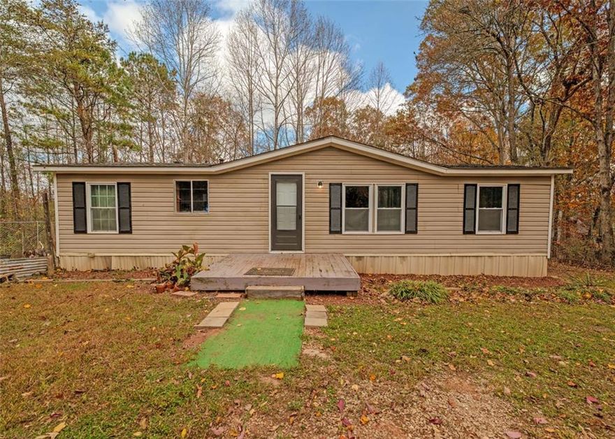 This home sits on a wonderful wooded, private lot in highly sought after Chestatee HS area of Hall County. This home is perfect for owner occupant or investor looking for an opportunity to add value with a little work. This 3 bedroom 2 bath split floorplan can be moved into immediately upon closing and updates can be completed while you enjoy your new home! Act now to be in your new home by Christmas!