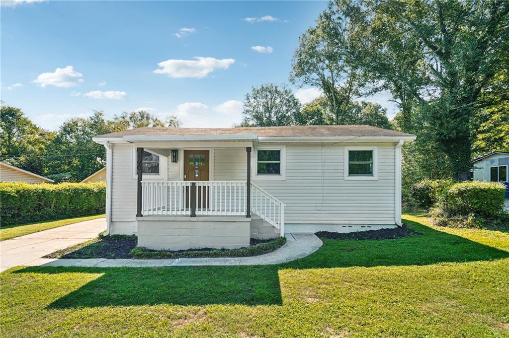 Welcome to this beautifully renovated home, boasting a fresh interior and exterior paint job in a tasteful neutral color scheme. The remodeled kitchen is a standout with a stylish accent backsplash, stone counter tops and all new stainless steel appliances. The entire home has been enhanced with new flooring, creating a seamless flow from room to room. This home is a perfect blend of style and comfort, ready for you to make it your own.. Included 100-Day Home Warranty with buyer activation