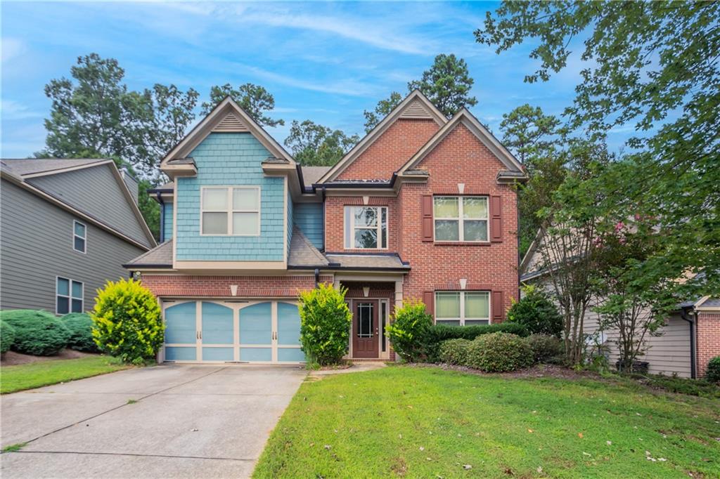 Beautiful two-story traditional home in the sought-after Sonoma Woods community. This residence offers a welcoming two-story foyer, a spacious great room with a cozy fireplace, and a chef’s kitchen featuring granite countertops, a center island, hardwood floors, and a tile backsplash. The primary suite includes a sitting area, tray ceiling, and dual walk-in closets, while the spa-like bath boasts double vanities, a soaking tub, and a separate shower. Secondary bedrooms are connected with a convenient Jack-and-Jill bath. Outside, enjoy a covered patio perfect for relaxing or entertaining, along with a landscaped, level yard. Ideally located near Suwanee Town Center, shopping, dining, and top Gwinnett County schools, this home combines comfort, style, and convenience.