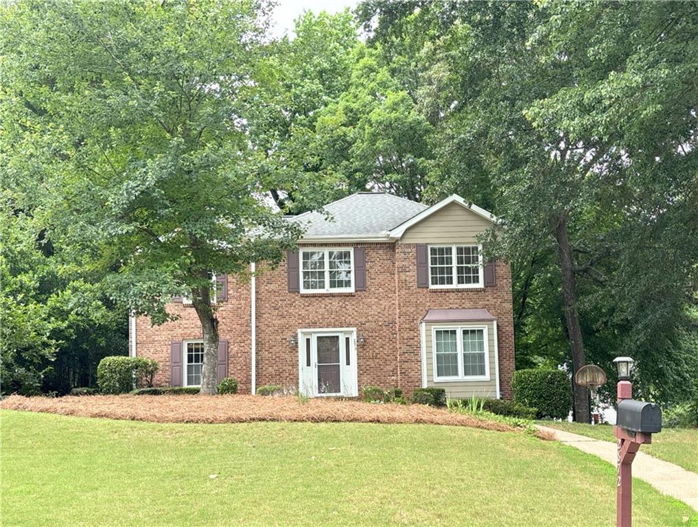 Meticulously maintained and move-in ready home in a desirable East Cobb community in award winning Pope, Dodgen, Murdock school districts. This spacious home features 4 bedrooms and 2 1/2 bathrooms, with updated kitchen and bathrooms. Granite kitchen countertop, white cabinets and stainless-steel appliances - refrigerator, washer and dryer are all included. Enjoy entertaining on large, shaded back deck. Unfinished basement level with 2 car garage area is perfect for storage and has space for a workshop. The home is close to Merchants Walk and Avenue East Cobb areas for shopping and dining. Walk to popular East Cobb Swim and Tennis Club directly across from the subdivision