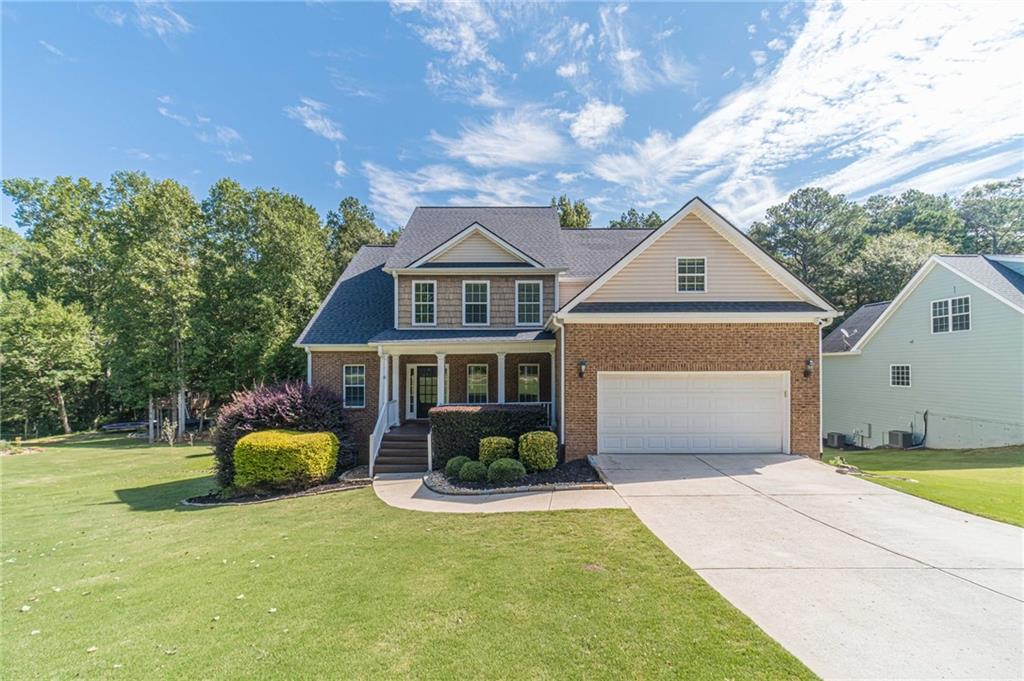 Loganville Schools! Recently Renovated 2 Story Home with a Finished Basement resting on over a Half Acre Lot! This Gorgeous Home has it ALL! Interior Features Owner Suite On the Main Level, Barn Door, Trey Ceiling-Owners Bath Features Double Vanities with Granite C-Tops-Tile Flooring and Tile Shower-2 Story Family Room with Brick Fireplace, Separate Dining Room with Custom Trim Package-Oversized Kitchen with Stained Cabinets-Granite Countertops-Stainless Steel Appliances, Recessed Lighting-Breakfast Area-Separate Open Office Area off the Kitchen or Formal Sitting Area-Your Choice! Upstairs Features 2 Generously Sized Secondary Bedrooms & BONUS ROOM with LVP Flooring and 1 Would Make a great teen suite! Finished Terrace Level Features Beautiful LVP Flooring-Fresh Carpet-Large Family/Game Area-Exposed Beam Ceiling-Large Wet Bar/Kitchen Area with Custom Wood Ceiling-Great for Game Day Parties-Family Gatherings-Finished Room with Ceiling Fan would make for a great guest stay or office-Double Doors Lead to Lower Level Oversized Deck perfect for Hot Tub overlooks Private Backyard-Half Bath with future Shower Area Ready to be finished-Storage Area-Great For Utility Storage-Exterior Features an Architectural Shingled Roof-Covered Rocking Chair Front Porch-Backyard Features 3 Covered Decks-Upper Level Deck has Custom Vaulted Tongue and Grove Ceiling and Oversized Ceiling Fan-Private Grilling Deck off the Kitchen Area-This Home Has So Many Upgrades and is PRICED TO SELL!!! MUST SEE TO APPRECIATE!!!**Tax Records Sq Footage is Inaccurate***