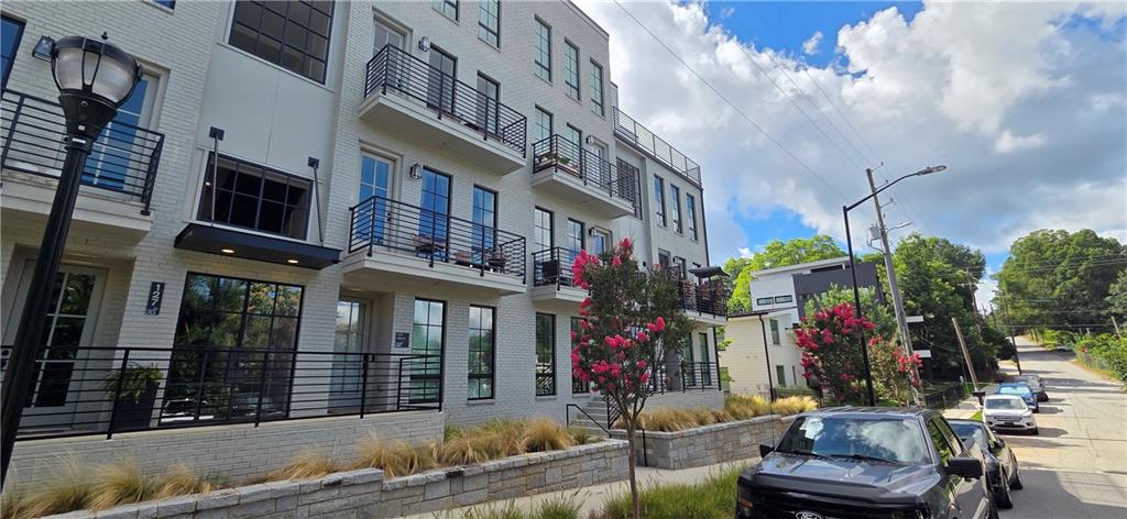 What gives a neighborhood that true sense of home? Is it the vibrant pulse of city life or the warmth of a connected community? At Empire Stein Steel, you don’t have to choose. Nestled in Reynoldstown—one of Atlanta’s most walkable and energetic neighborhoods—this 6.5-acre community redefines urban living with a mix of modern townhomes, stacked condos, and welcoming green spaces, all just steps from and with a view of the BeltLine. It’s where a strong community spirit meets the heart of the city, merging historic charm with a bold, contemporary lifestyle.
Discover the pinnacle of stacked condo living in this remarkable 2-bedroom, 2-bath, 2-story stacked condominium with a patio. This unit is high style all the way with all luxury fittings. Only 1 year old. The main level features an open-concept design with a generous family room that flows effortlessly into the modern kitchen, creating a welcoming space for both everyday living and gatherings. A secondary bedroom and full bath add flexibility and comfort to the layout. All rooms feature automatic blinds! Upstairs, retreat to the expansive primary suite, offering privacy and luxury. A private 1-car garage is conveniently located on the ground level. Pets allowed with deposit. Welcome to a new level of refined, elevated living. **Not vacant showing schedule - showings available ONLY Monday to Saturday 1030-230pm and Sunday 12-4pm. Must have at least 24 hour notice for the resident owner.