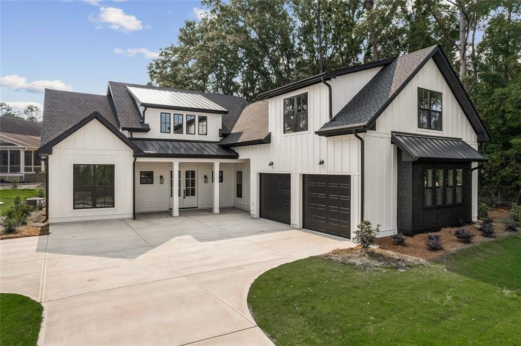 Nestled in the heart of Cuscowilla on Lake Oconee, this exceptional custom residence offers luxury living with breathtaking lake views in one of Georgia’s most exclusive gated communities. Enjoy 24-hour security, world-class golf, and lake access in this private enclave.
Boasting over 3,800 heated square feet, this home was thoughtfully designed for both elegance and comfort.Main Level (2,263 sq ft heated): Enjoy tranquil views of Lake Oconee from the expansive living spaces and back patio. Gourmet kitchen with GE Café appliances, propane range, custom cabinetry, and large center island
Spacious primary suite with spa-like en suite bath and serene lake views. Covered 702 sq ft patio ideal for entertaining or relaxing as you watch the sunset over the water.Formal and casual dining areas,
Guest powder room and main-level laundry room, Oversized 873 sq ft garage with storage for vehicles, golf cart, and more.
Upstairs (1,573 sq ft):
Three well-appointed bedrooms and two full bathrooms, Large bonus room perfect for a media room, office, or play space. Second laundry room for added ease.
From morning coffee overlooking the lake to evenings spent enjoying all the amenities of Cuscowilla’s private golf and lake community, this home offers the perfect blend of beauty, luxury, and lifestyle.
Don't miss this rare opportunity to own a lake-view home in Cuscowilla. Schedule your private tour today.