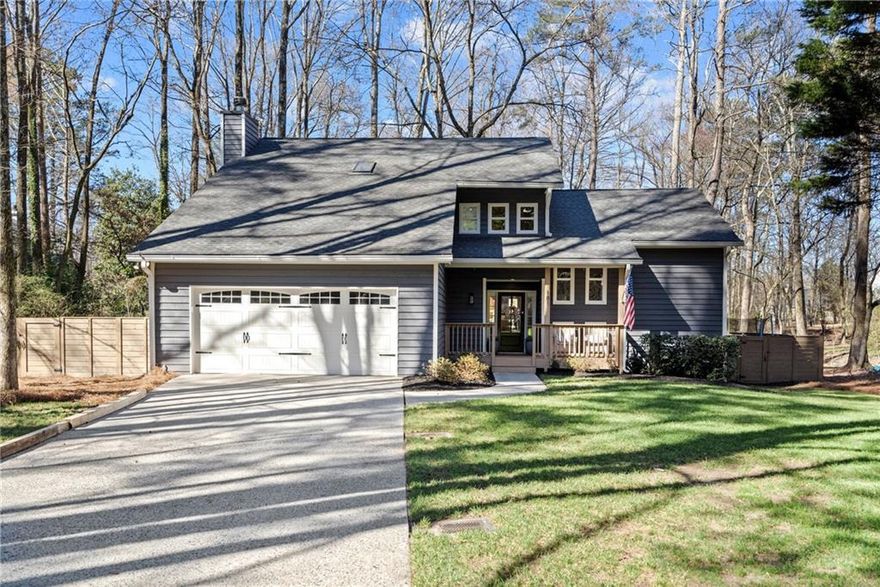 WELCOME HOME to a slice of paradise in the highly sought after location within close proximity to Downtown Alpharetta and Wills Park!  This completely renovated, modern, and incredibly charming home will take your breath away as soon as you pull up to it! This home is like new with newer light colored oak hardwood floors throughout, including all four bedrooms, newer windows, 5 year old roof, brand new water heater, trex decking, and more!  Every bathroom has been completely renovated with beautiful tile and vanities. The master bathroom features a skylight and stand alone soaking tub. Enjoy the convenience and luxury of the closet system in the master closet. The kitchen is updated with white cabinets and white quartz countertops and beautiful tile backsplash. The open concept kitchen overlooks the family room with a gas fireplace, which is a perfect place to cozy in on cold winter evenings.  Bedroom on main floor is currently being used as an office and has a beautiful Murphy bed for multipurpose use. Walk outside onto the gorgeous trex deck overlooking a private, fenced, well landscaped yard. Enjoy roasting s'mores on summer evenings at the fire pit and enjoy peaceful sunsets while sitting on the deck to unwind after a long day.  This outdoor space and home are a true oasis and provide peace and tranquility. No HOA. You do not want to miss this one! Come and see it today!